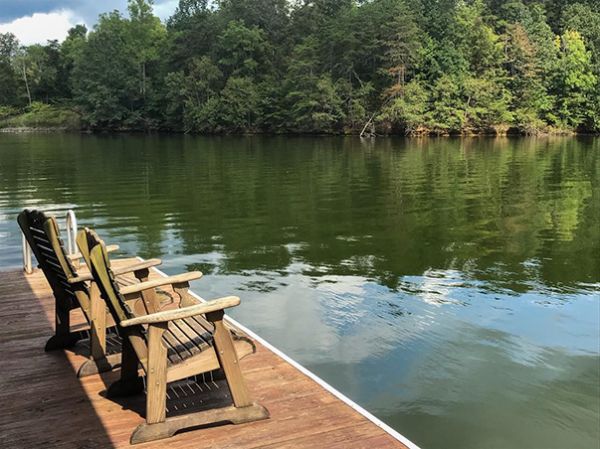 Chairs on the dock at a Smith Mountain Lake cabin