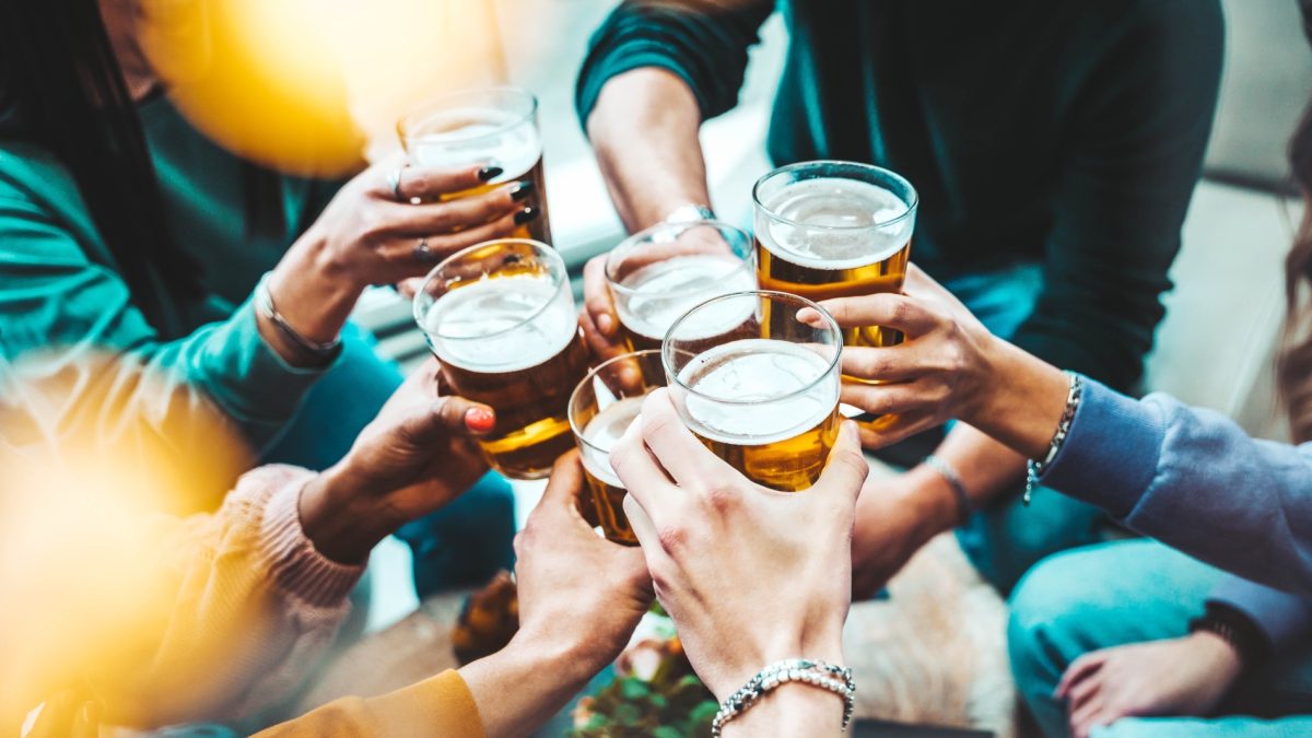 friends toasting with beers