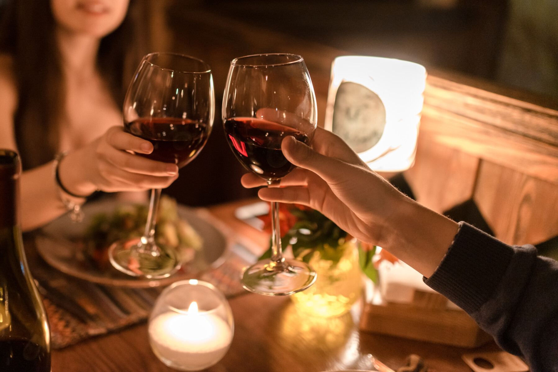 couple with wine at romantic dinner
